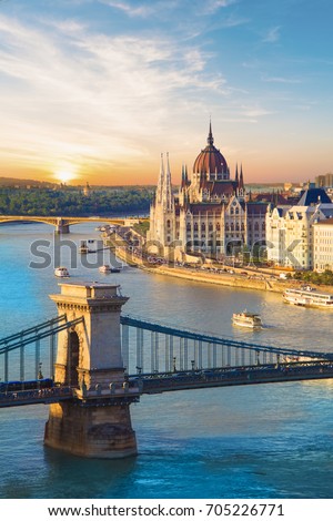 Beautiful view of the Hungarian Parliament and the chain bridge in Budapest, Hungary Royalty-Free Stock Photo #705226771