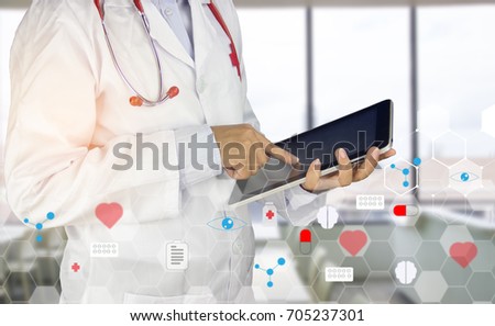 Healthy And Medicine concept .Doctor using a digital tablet