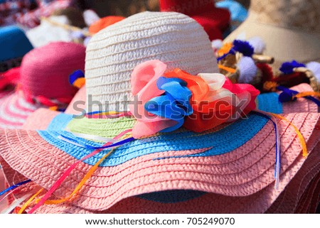 close up view of Colorful straw hats