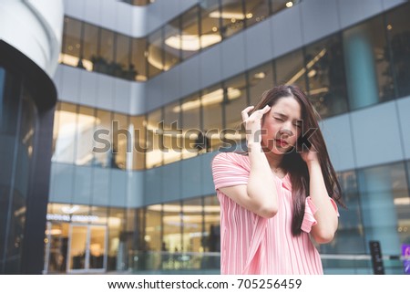 Young Asian girl feeling stress 