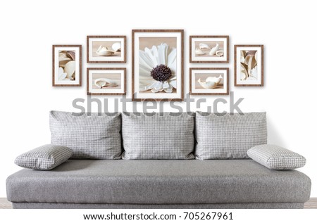 Frames collage with abstract floral pictures over modern couch, interior decor mock up
