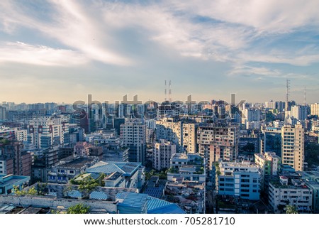 skyline aerial view at sunset with colorful cloud and skyscrapers of dhaka city