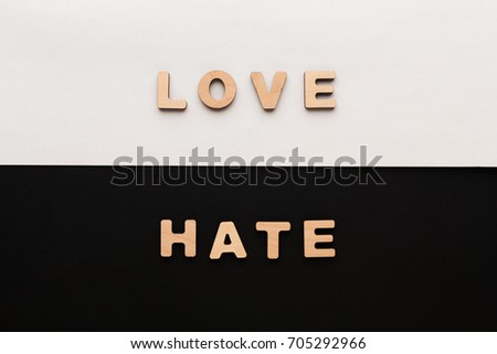 Words Love and Hate on contrast background. Opposite feelings, strong emotions concept