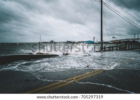 Water coming over the streets in Kemah during Hurricane Harvey  Royalty-Free Stock Photo #705297319