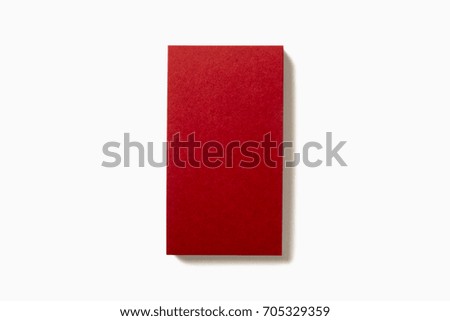 Red empty Business Card isolated on white. Textured paper.