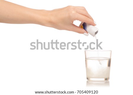 Female hand holding glass of water powder medicine on white background isolation
