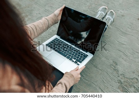 Beautiful Young Girl Working on Laptop Outside Her Office, Freelance Concept.