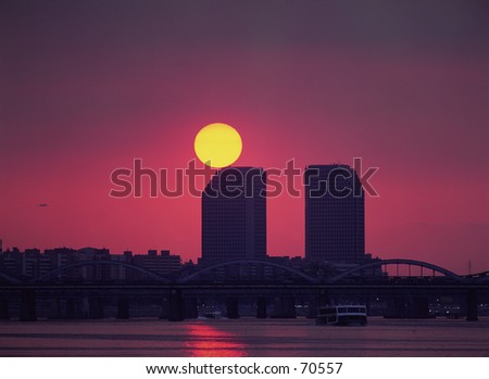 sunset over city scape 
