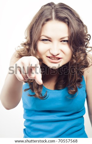 Young beautiful happy caucasian woman pointing on you