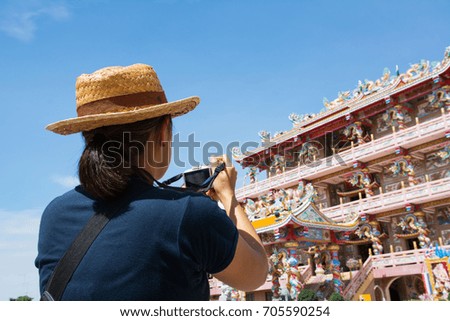 Tourist are taking photos of Chinese temples
