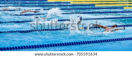 Swimming at pool, Water sport concept Royalty-Free Stock Photo #705591634