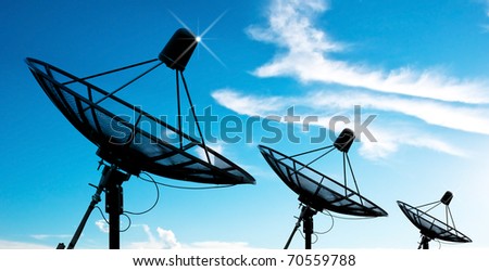 satellite dish antennas under sky Royalty-Free Stock Photo #70559788