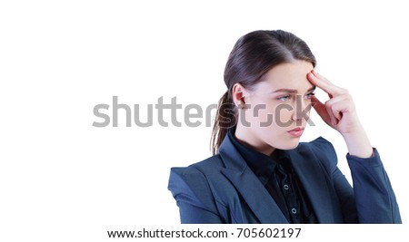 Portrait of a serious business woman thinking on isolated white background.