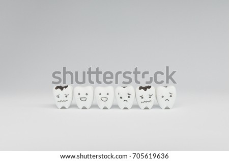 Decayed tooth model and good teeth for dental health care concept