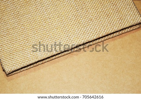 Note book, sackcloth and brown khaki