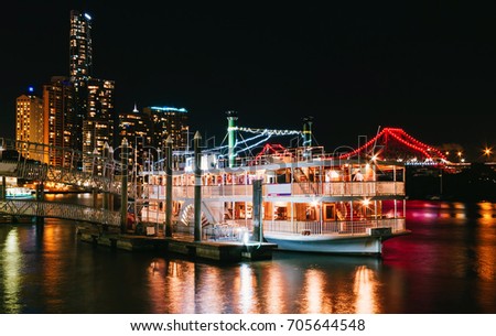 Showboat in Brisbane at night time Royalty-Free Stock Photo #705644548