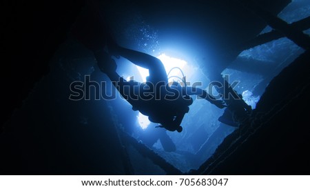 diver inside the SS thistlegorm, red sea, 2017 Royalty-Free Stock Photo #705683047