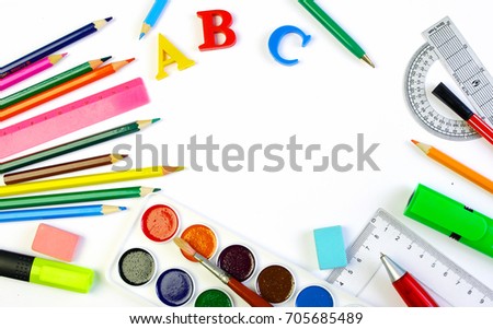 School supplies on a white background. Beginning of the school year. Copy spaces.