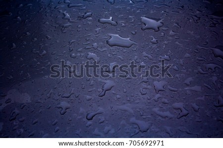 Picture of rain falling on the windshield