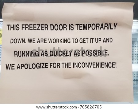 this freezer door is temporarily down sign
