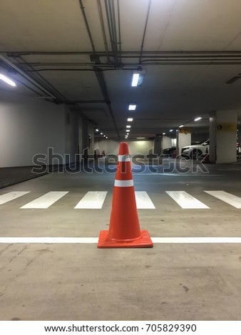 Cone for traffic control in the parking building.