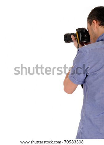  professional male photographer from back taking picture.copyspace . isolated on white background
