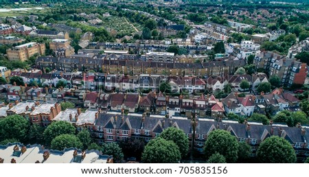 Aerial view of a typical Victorian village in West London by the river Thames Royalty-Free Stock Photo #705835156
