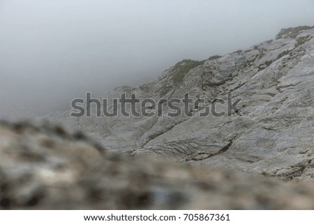 The fog that creeps up on the mountains,Caucasus, Arkhyz, Karachaevo-Cherkuskaya republic, Russia