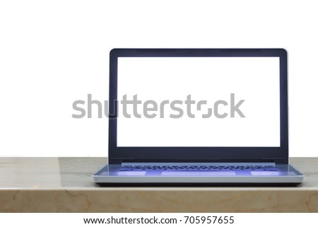 Laptop on brown marble table isolated on white background. Blank screen notebook for display free space montage.