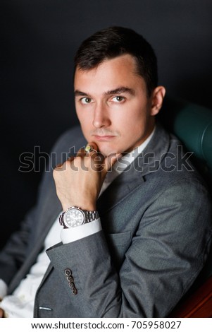 Image of business man in suit
