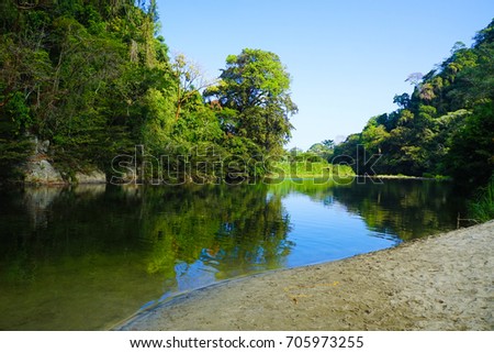 Swimming Hole in Colombia Royalty-Free Stock Photo #705973255
