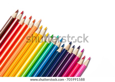 Set of colored pencils isolated on white background. A bright picture on the theme of drawing, education, school, creativity