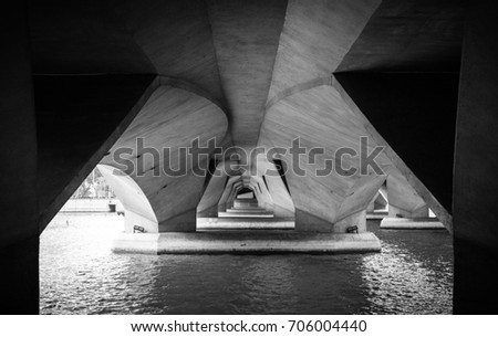 Under the bridge in Singapore in black and white.