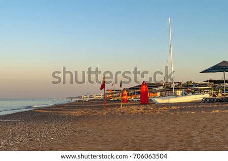 Holiday vacation travel concept: Sea surf on a beach in the early morning. Titreyengoel
