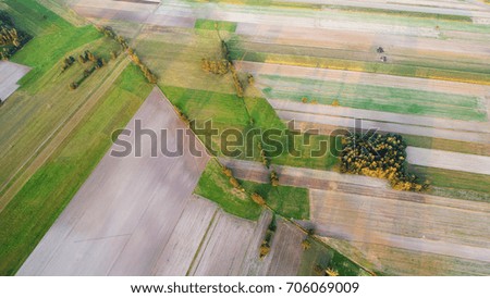 Aerial landscape with fields at sunset