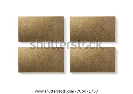 Golden blank business card isolated on white. Textured gold paper.