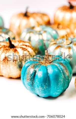 Shiny Decorative Pumpkins. Halloween decorations.  trendy holiday concept.