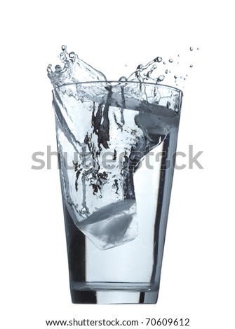 Pouring water into glass isolated on white background