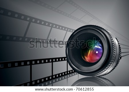 lens and film strip on black background