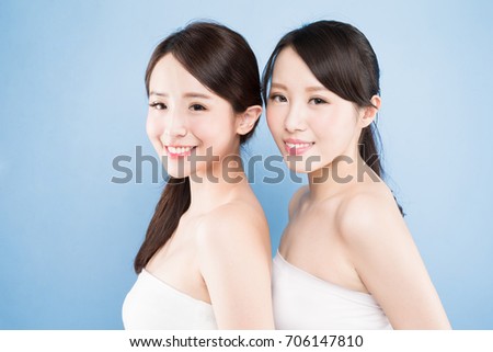 two beauty woman with healthy skin care on the blue background