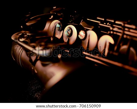 Vintage Alto Saxophone on black background
