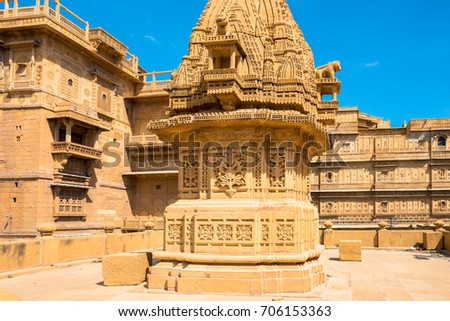 Horizontal picture of hindu temple carved yellow sandstone architecture in Jaisalmer, known as Golden City in India.