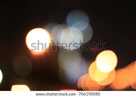 Bokeh Abstract background from car in street in night time. Elegant abstract background with bokeh defocused lights.