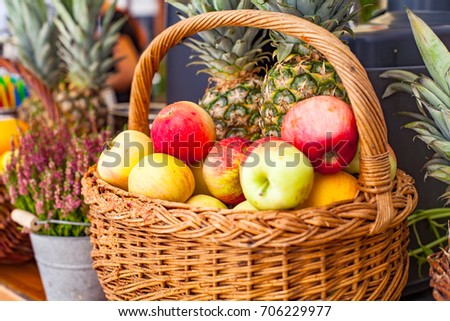 Picture of tasty fresh fruits in basket on a bar counter