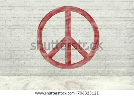 Red peace icon on white brick wall