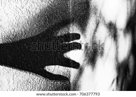shadow of hand Royalty-Free Stock Photo #706377793