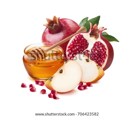 Red apple, pomegranate and honey jar for Jewish New Year isolated on white background for poster design Royalty-Free Stock Photo #706423582