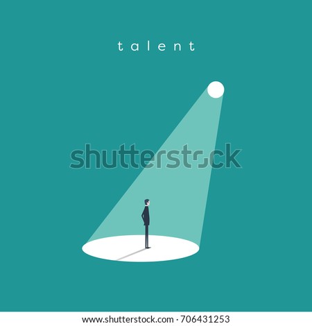 Business recruitment or hiring vector concept. Businessman standing in spotlight or searchlight as symbol of unique talent and skills. Eps10 vector illustration. Royalty-Free Stock Photo #706431253