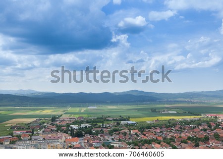 Landscape Panorama over a mountain city in the sping. Traveling and architecture