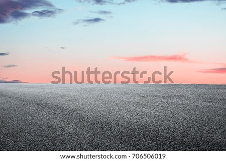 Asphalt road and beautiful sky landscape at sunset